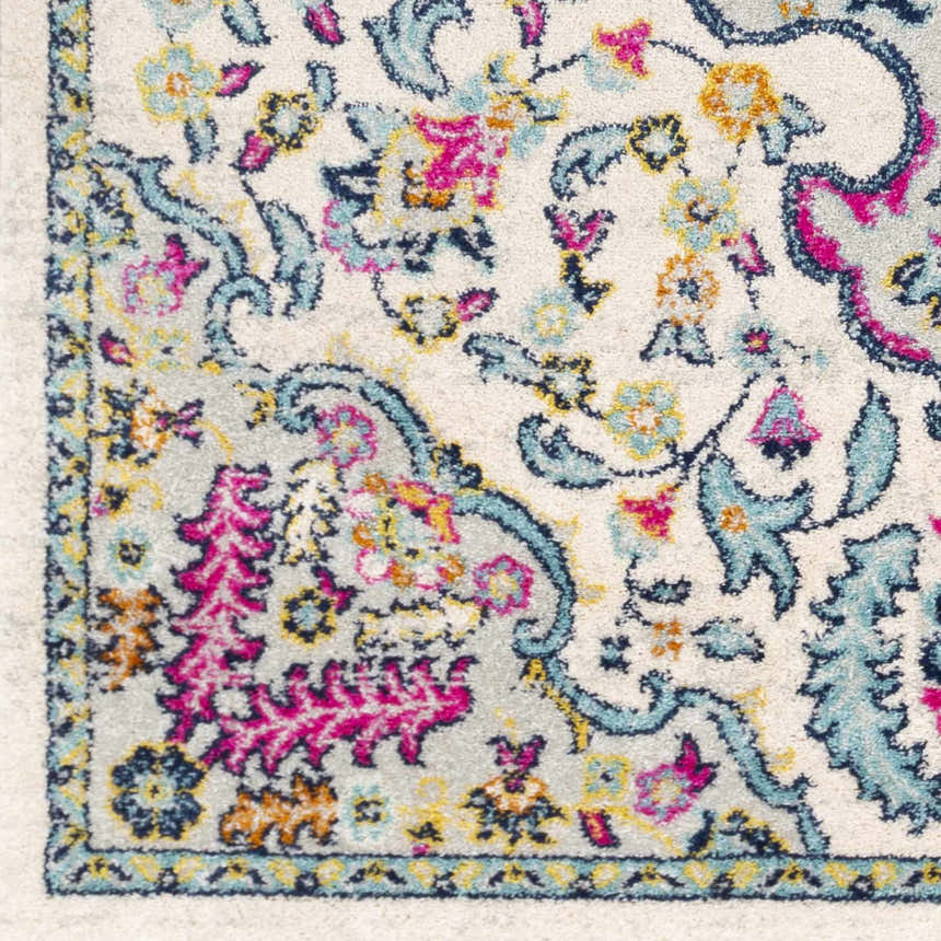 Close-up of the Errol Area Rug. Features a white base with aqua, pink, and yellow floral and paisley patterns. Swatch