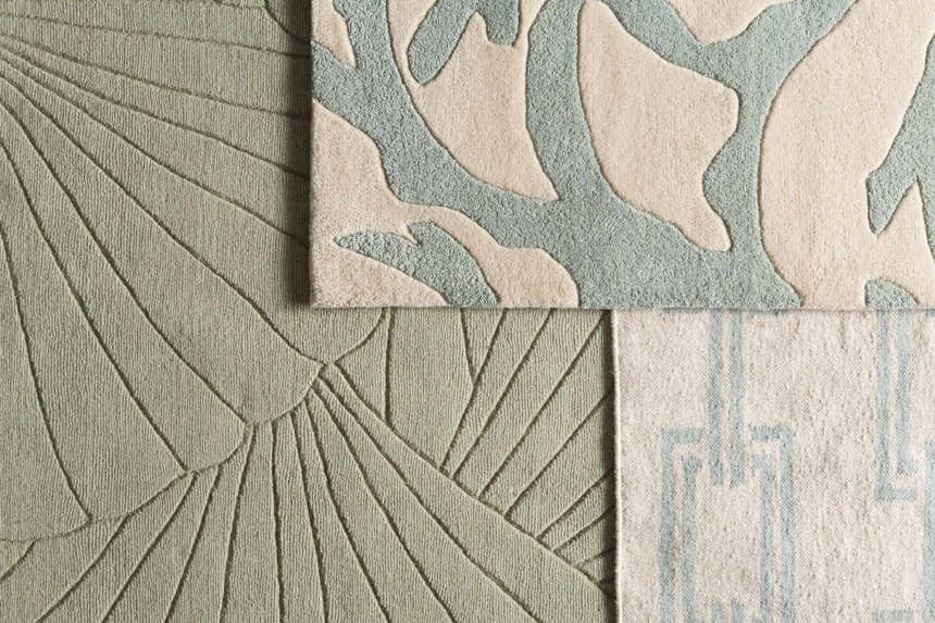 Close-up of Billerica Area Carpet showing beige, dusty sage, and geometric patterns. Hand woven wool texture. Styleshot