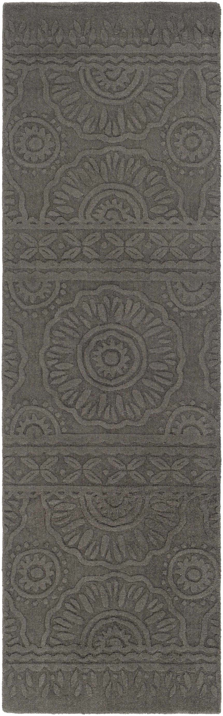 Close-up of the charcoal Eversholt Clearance Rug, a hand-loomed wool runner with a contemporary floral and geometric pattern. Design-Runner-268