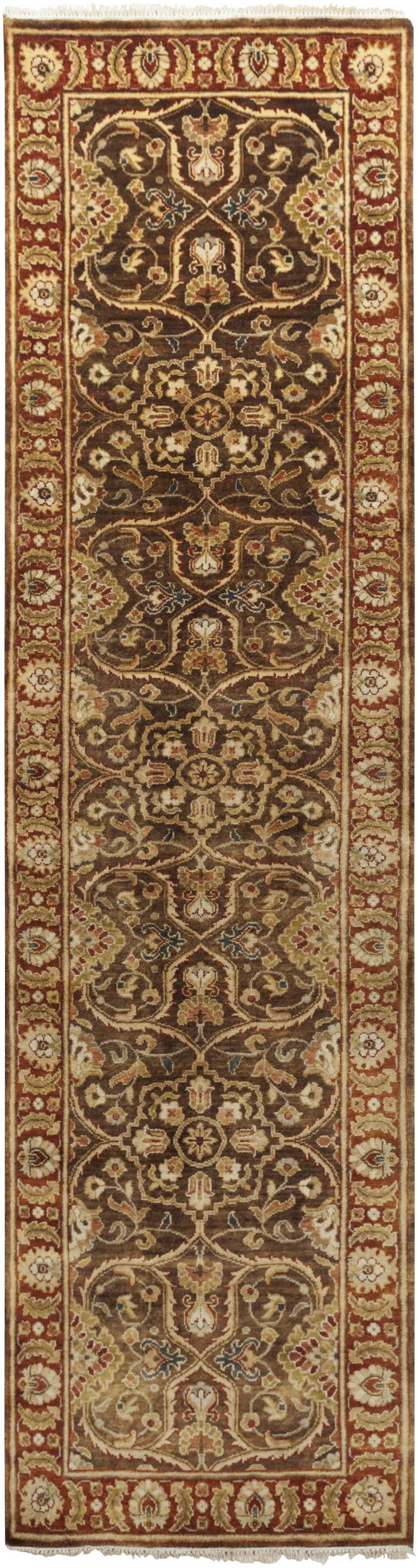 Close-up of the Fate Area Rug, a hand-knotted runner with traditional floral patterns in brown, burnt orange, and blue. Design-Runner