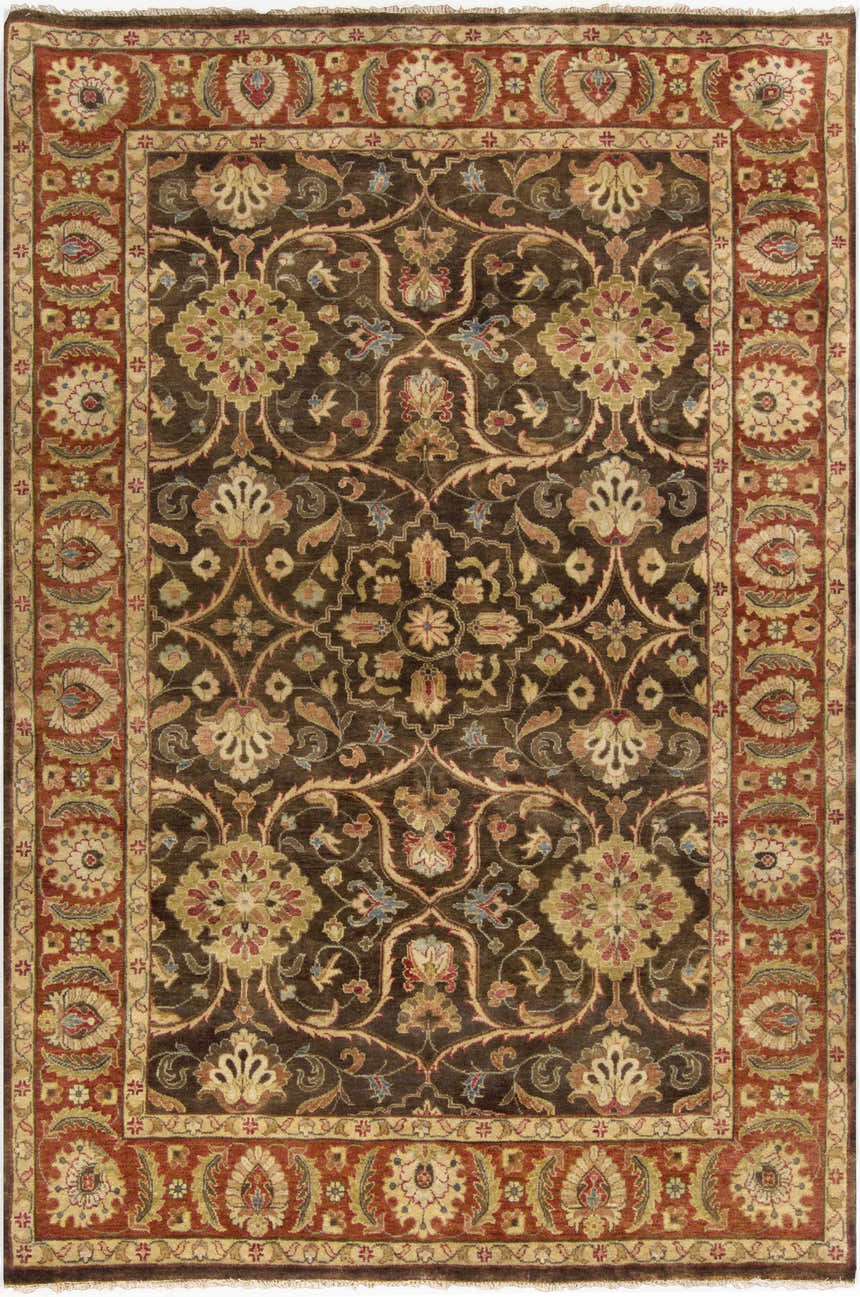 Close-up of the Fate Area Rug. Hand-knotted wool rug in burnt orange, dark brown, and sky blue floral pattern. Design-Rectangle