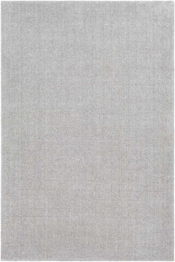 Close-up of the hand-tufted Fife Area Rug. Solid light gray wool rug with subtle striped texture. Contemporary style. Design-Rectangle-576