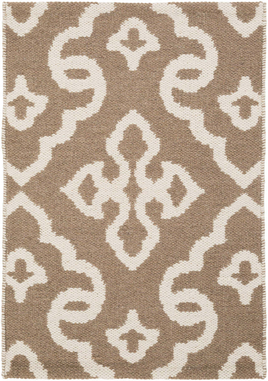 Close-up of the Fitzpatrick Reversible Area Carpet, showcasing its cream and medium brown bohemian-inspired pattern and hand-woven texture. Design-Rectangle-23