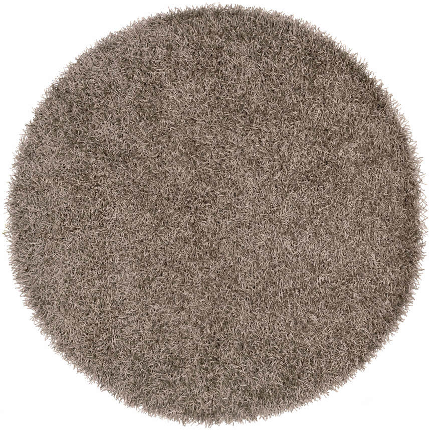 Close-up of a round Browder Solid Brown Shag Rug, showcasing its dense, hand-woven polyester texture. Clearance item. Design-Round-6