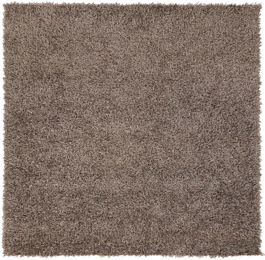 Close-up of the Browder Solid Brown Shag Rug, a hand woven polyester rug with a soft, textured shag pile. Design-Square-88