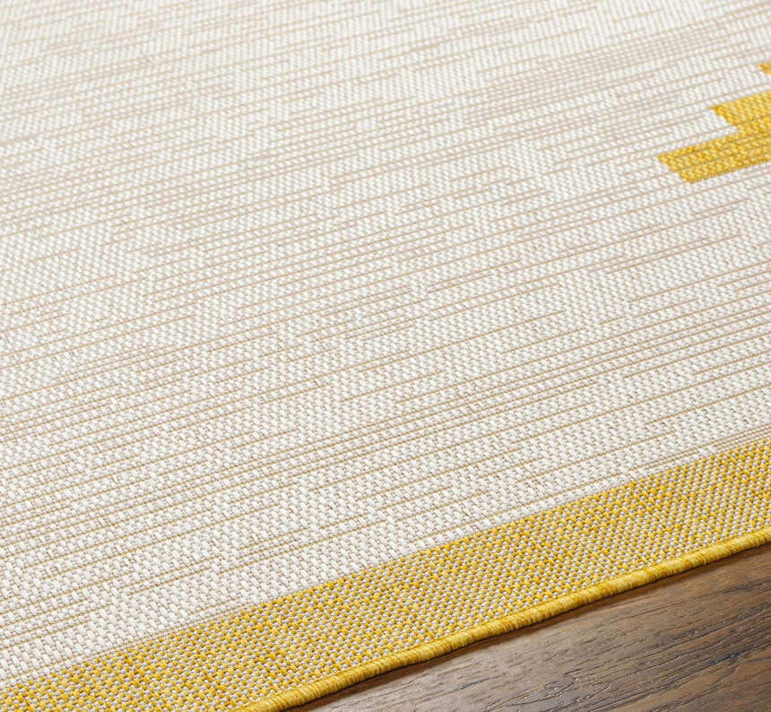 Close-up of Djugun Yellow Outdoor Rug showing beige, bone, and yellow geometric pattern and woven texture. Texture