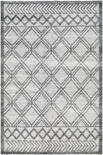 Close-up of the Gada Area Rug. Hand-woven rug with a geometric diamond pattern in dark gray and light gray. Design-Rectangle-576