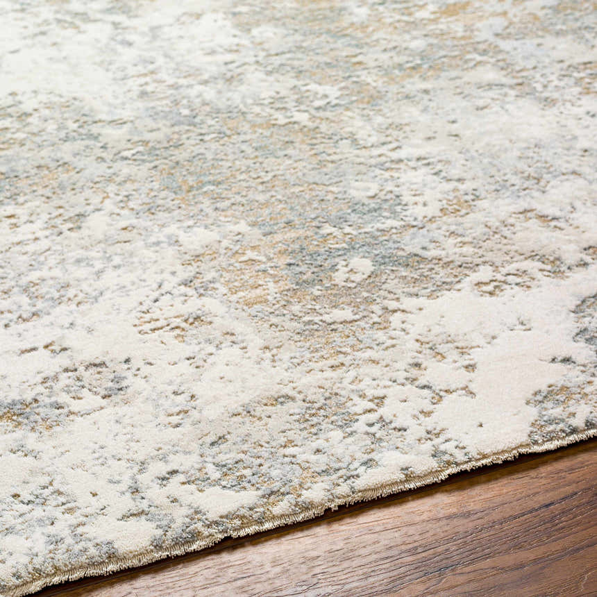 Close-up of the Ganit Thick Luxe Boutique Rug. Beige, bone, and gray abstract pattern. Luxe texture. Texture