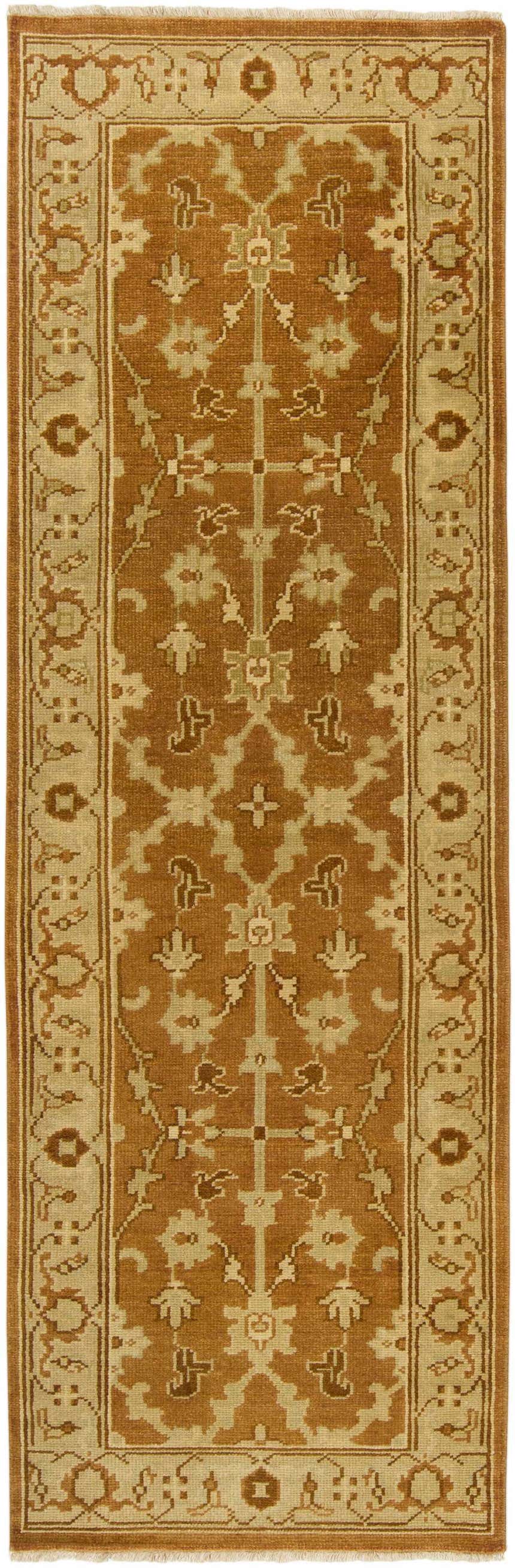 Close-up of the Gatzke Area Rug runner. Camel and tan colors with a traditional, hand-knotted pattern. 100% NZ Wool. Design-Runner-268