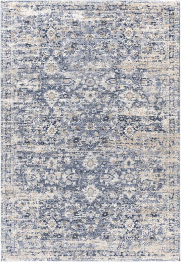 Close-up of the Talihina Denim Damask Area Rug. Features a traditional floral pattern in denim blue, cream, and gray tones. Design-Rectangle-5373