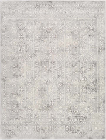 Close-up of the Michie Gray Area Rug. Machine woven with a traditional, bohemian pattern in charcoal, light gray, and off-white. Design-Rectangle-537