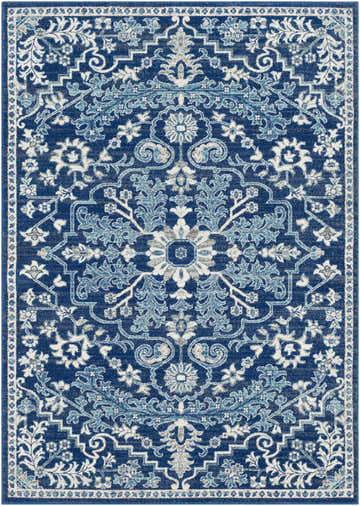 Detailed view of the Blue Bodrum Area Rug, featuring a traditional floral pattern in navy, light beige, and gray tones. Design-Rectangle-5373