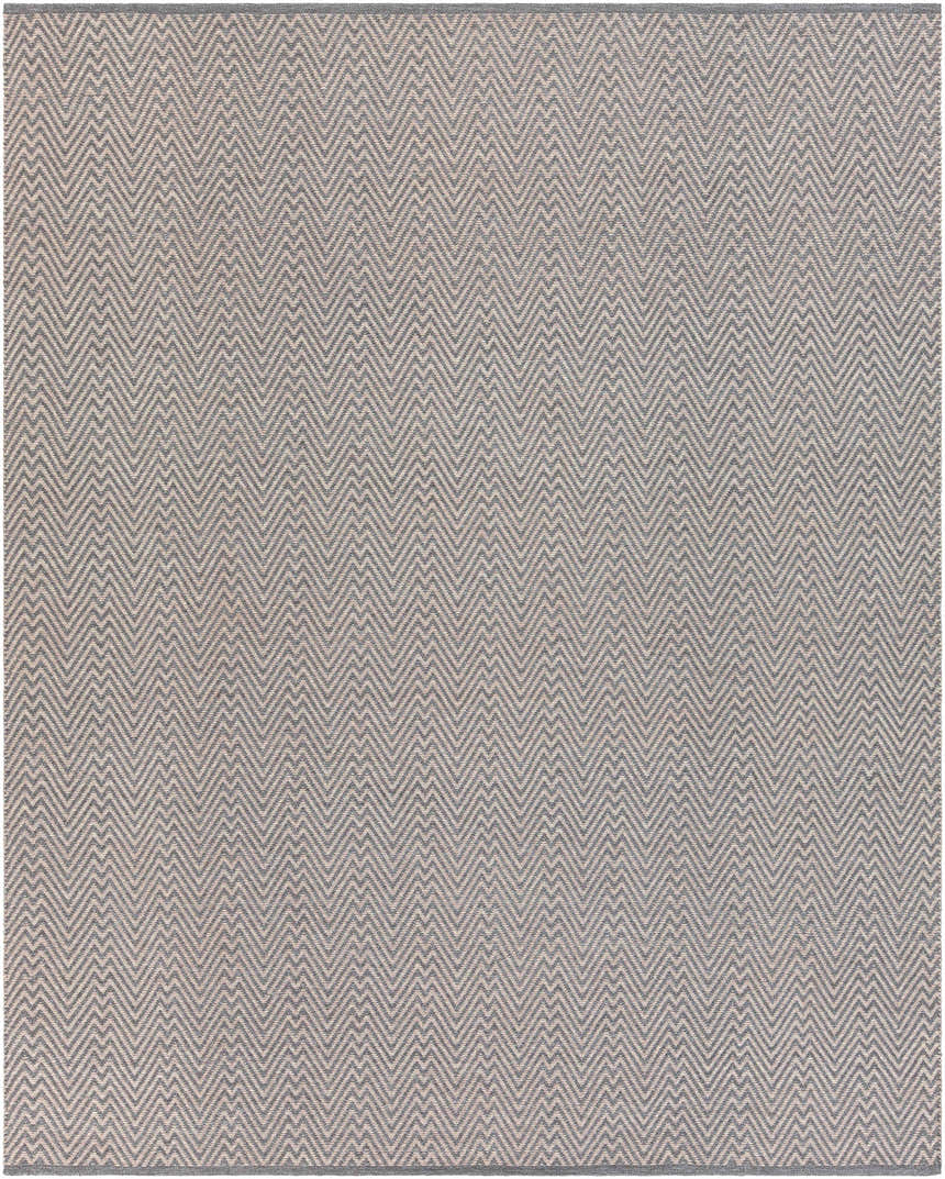Close-up of the Herlong Charcoal Herringbone Rug, showing its charcoal and light brown woven chevron pattern. Design-Rectangle-810