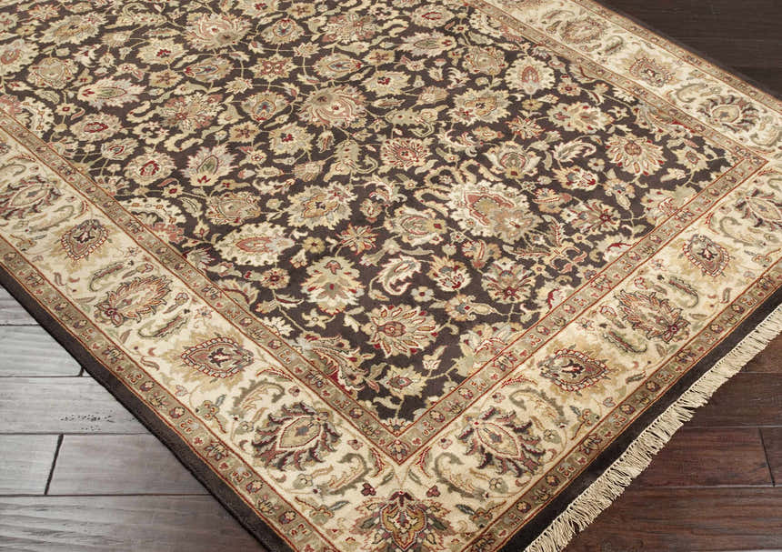Close-up of the Hillisburg Premium Wool Carpet. Features a traditional floral pattern in brown, beige, and burgundy. Hand-knotted texture. Corner