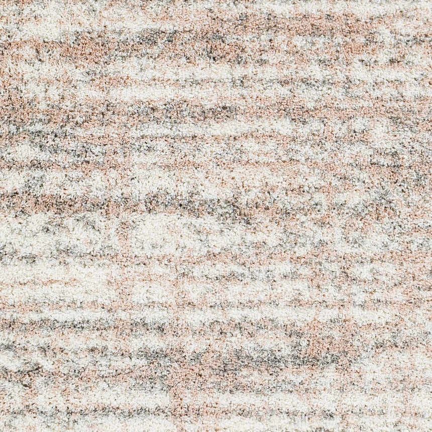 Close-up of the Hammond Dusty Pink Plush Rug showing cream, dusty pink, and gray shag texture. Swatch
