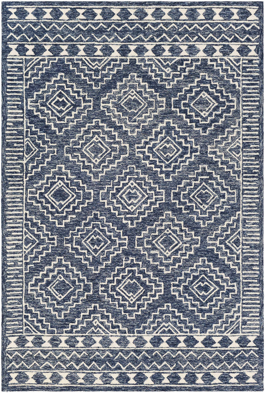 Detailed view of the Horton Modern Wool Rug in navy and beige, featuring a geometric, bohemian-inspired pattern. Design-Rectangle-576