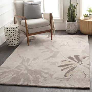 Living room scene with gray chair and Ilfeld Athena Gray Floral Wool Rug. Roomscene-Rectangle