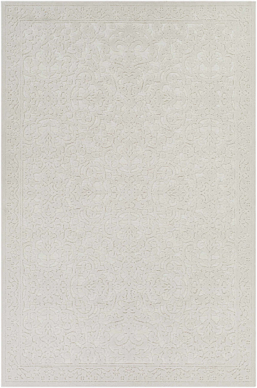 Close-up of the beige Innaloo 3D Outdoor Area Rug with a subtle, raised Bohemian-style floral pattern and border. Design-Rectangle-5373