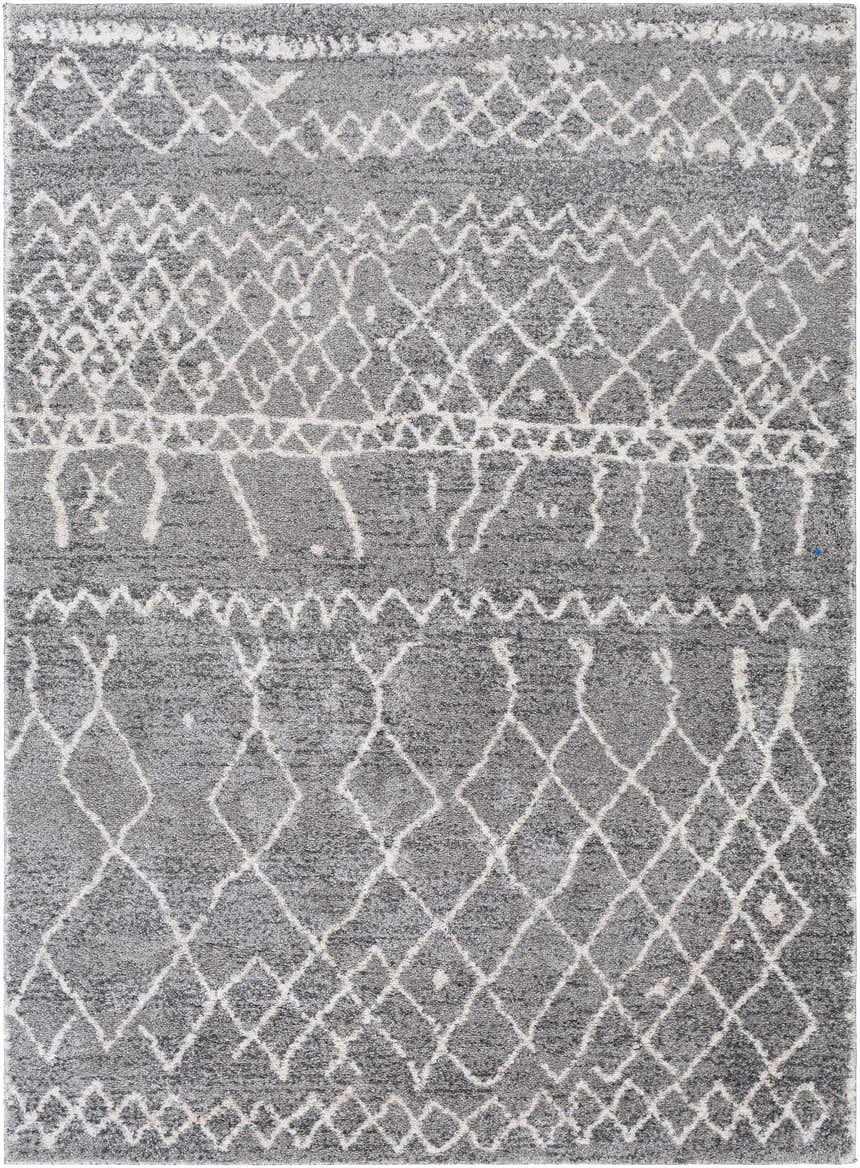 Close-up of the Kessingland Area Rug, a machine-woven rug with a gray and off-white geometric pattern. Design-Rectangle-5373