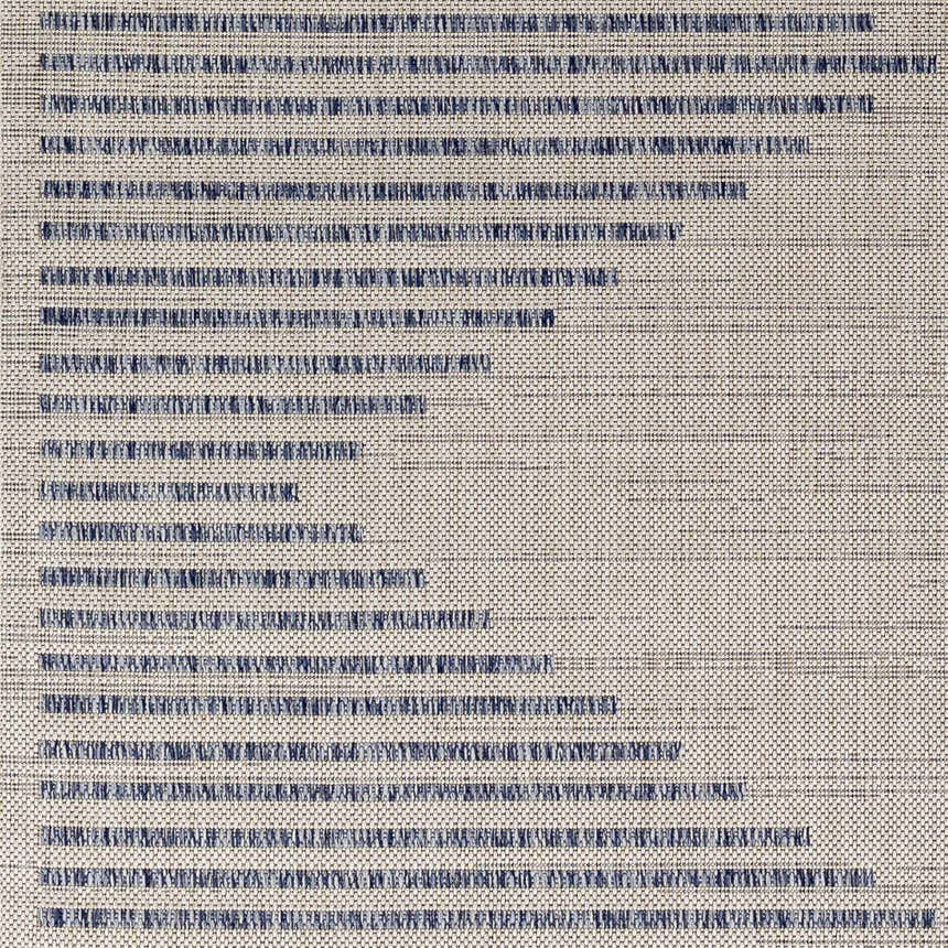 Close-up of the Khandallah Area Rug showing cream and navy geometric stripes and woven texture. Swatch