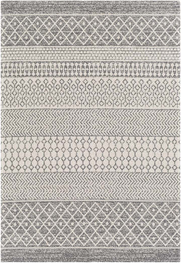 Close-up of the Lester Washable Area Rug, showcasing its gray, charcoal, and white bohemian-inspired geometric pattern. Design-Rectangle-5373
