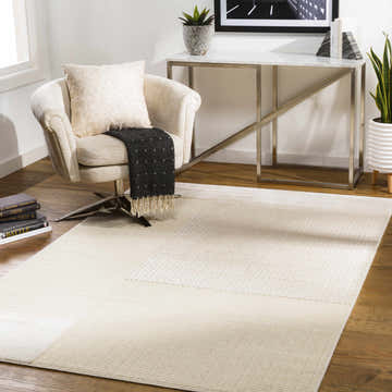 Modern living room with a beige Lice Area Rug, accent chair, and marble-top console table. Roomscene-Rectangle