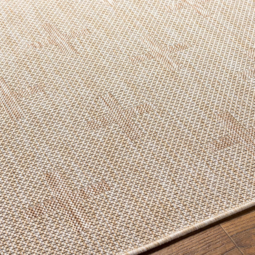 Close up of the Limbo Beige Outdoor Area Rug showing its woven texture and neutral tan, cream, and brown colors. Texture