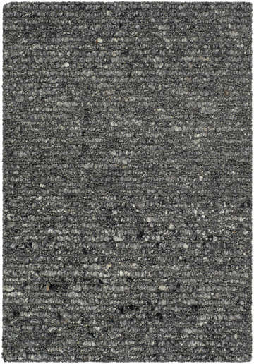 Close-up of the hand-tufted Winta Black Wool Area Rug. Gray, medium gray, and onyx tones create a textured, farmhouse style. Design-Rectangle-23