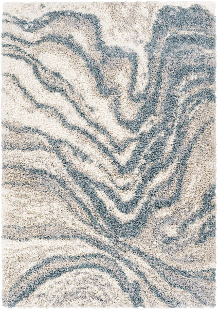 Close-up of the Lottery Area Rug, a contemporary shag rug with blue, cream, and light gray wavy pattern. Design-Rectangle-537