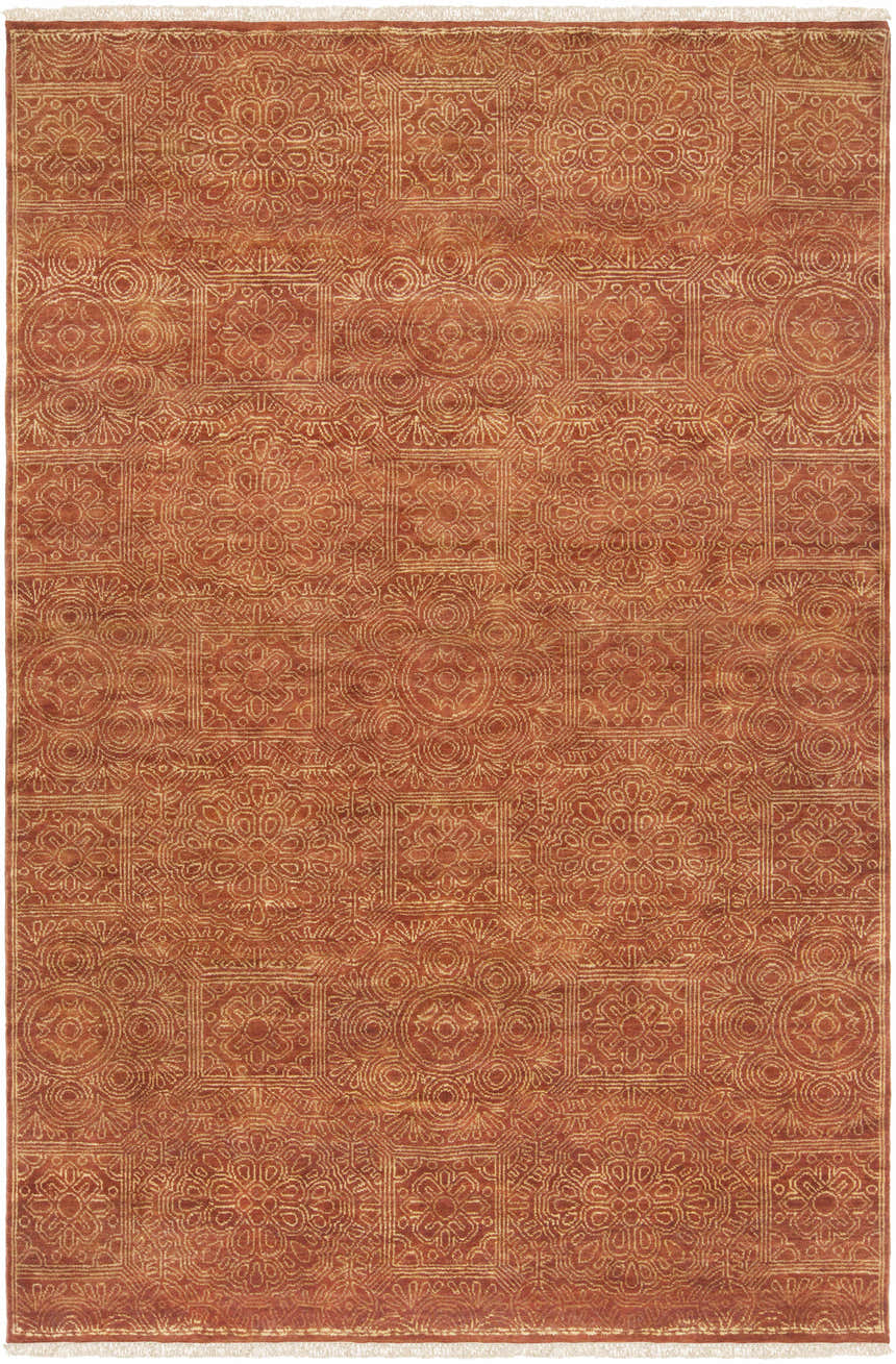Close-up of the Lottsburg Premium Orange Wool Rug. Hand-knotted rug with traditional floral and geometric patterns in blush, brown, and tan. Design-Rectangle-5686