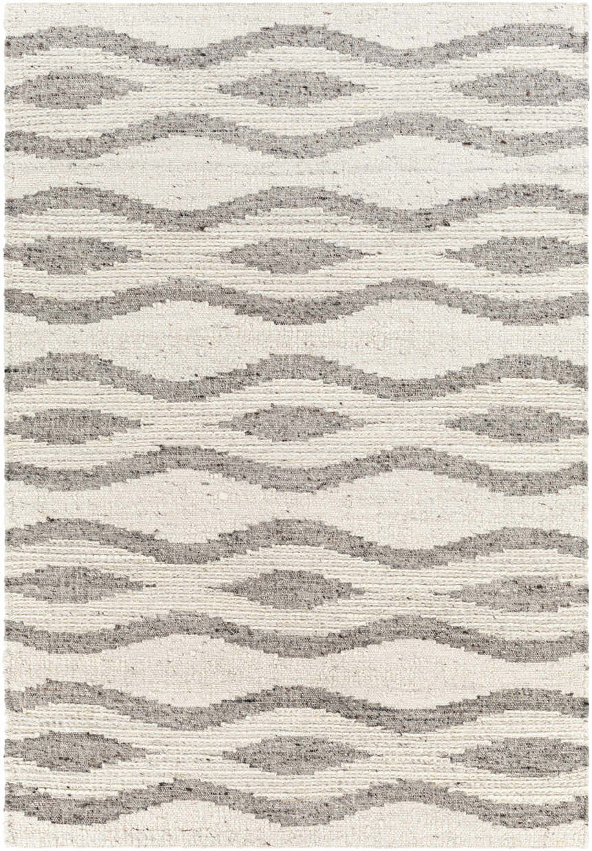Close-up of the Lavalwaves hand-woven wool rug. Features a cream background with charcoal and brown wavy pattern. Design-Rectangle-576