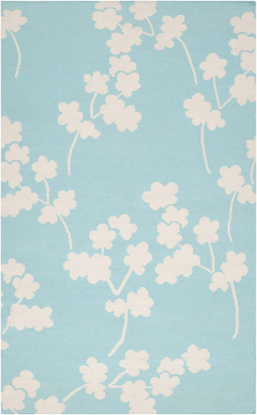 Close-up of the Matador Area Carpet. Aqua wool rug with a light beige floral pattern. Hand woven. Design-Rectangle-58