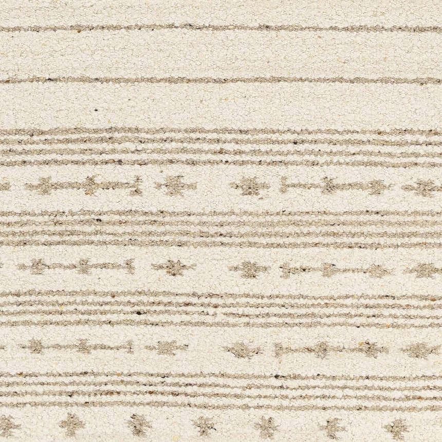 Close-up of the hand woven Matawan Premium Wool Rug. Cream rug with brown stripes and geometric pattern. Swatch