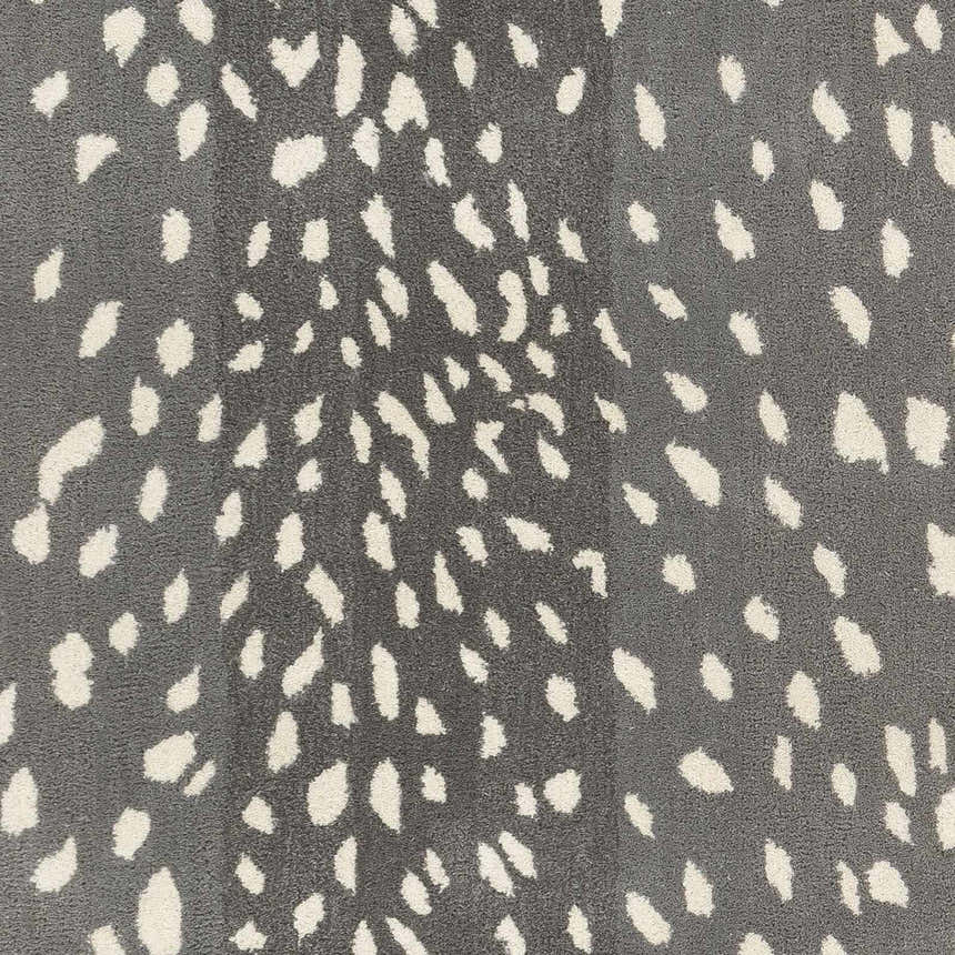 Close-up of the Athena Gray Giraffe Print Wool Rug. Cream spots on a gray, hand-tufted wool rug. Contemporary animal print. Swatch