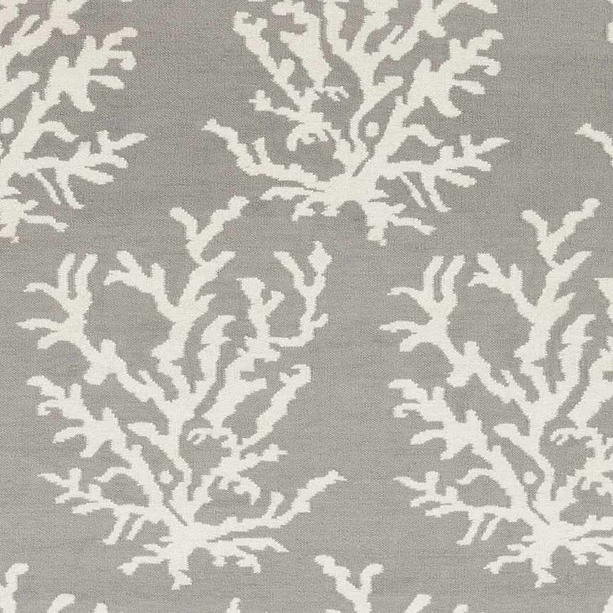 Close-up of the Merchantville Area Rug. Ivory coral-like pattern on a light gray, hand-woven, 100% wool rug. Swatch