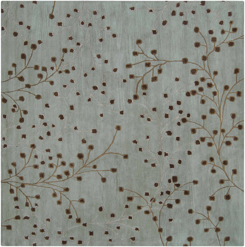 Close-up of the Sage Elsu Area Rug. Sage green wool rug with a dark brown and taupe floral branch pattern. Design-Square-8