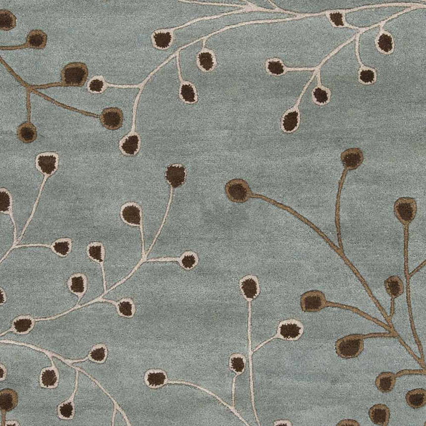 Close-up of the Sage Elsu Area Rug. Sage background with brown floral branch pattern. Hand-tufted wool texture. Swatch