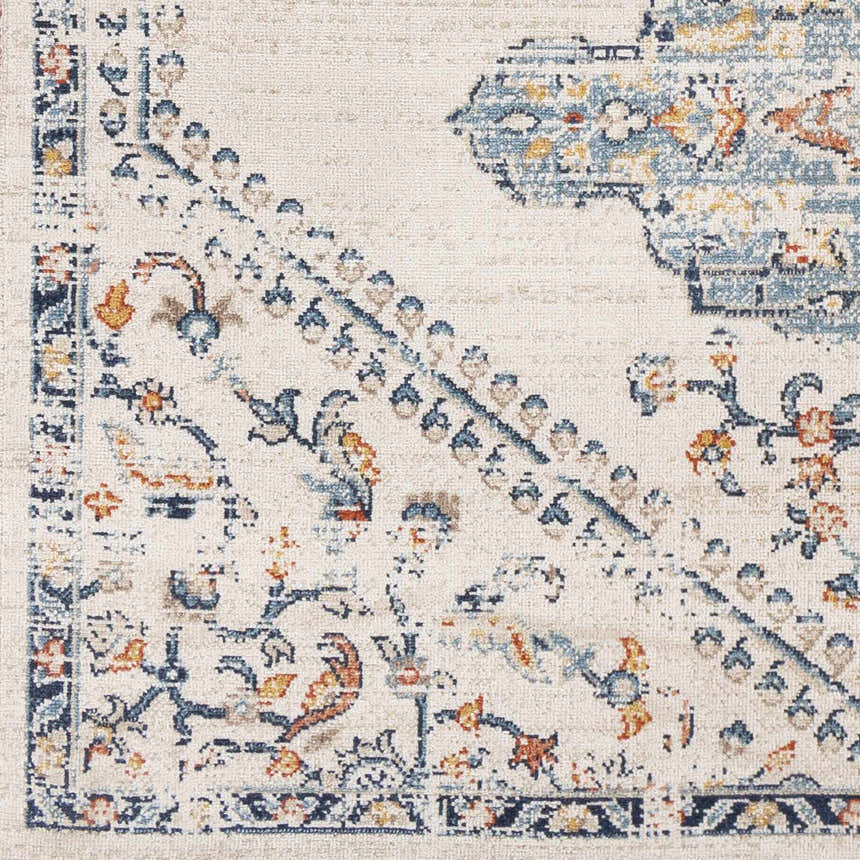 Close up of the Mistissini Area Rug showing its cream, blue, and orange traditional floral pattern. Swatch