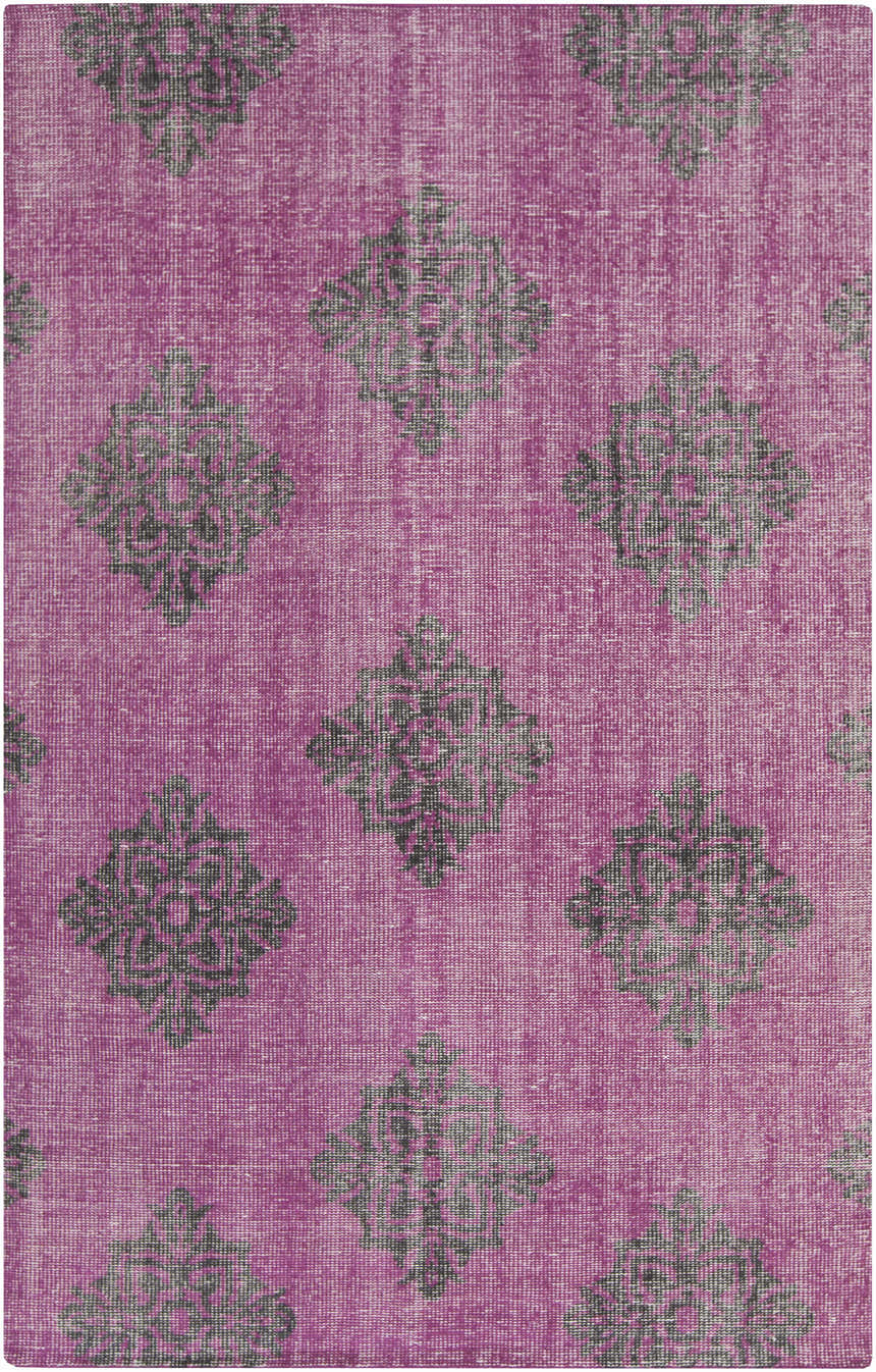 Close-up of the Mina Area Rug, featuring a fuchsia background and black diamond-shaped floral patterns. Design-Rectangle-5686