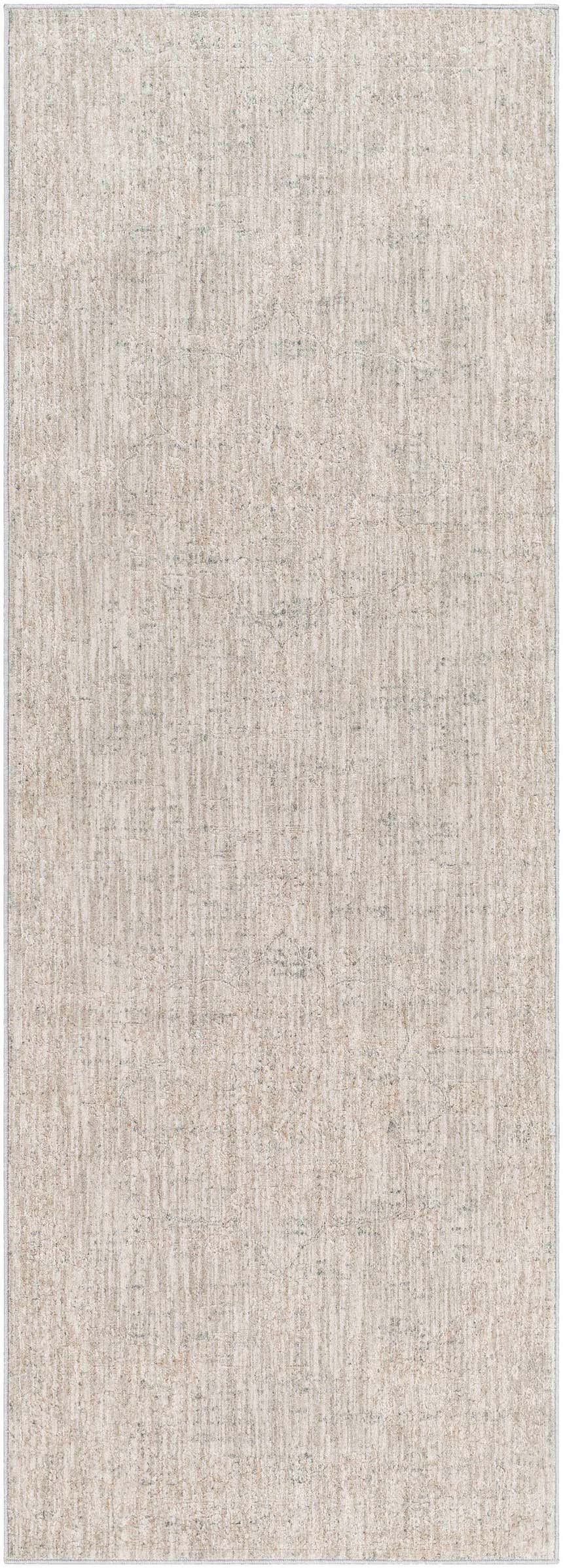 Close-up of the Monto Luxe Rug. Machine-woven polyester rug in charcoal, cream, gray, and taupe. Design-Runner-2773
