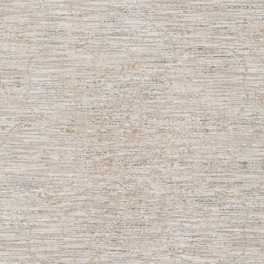 Close-up of the Monto Luxe Rug. Machine-woven polyester rug in charcoal, cream, gray, and taupe with a subtle, textured pattern. Swatch