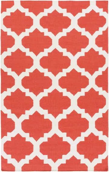 Close-up of the Moccasin Area Carpet showcasing a coral and cream quatrefoil pattern. Hand-woven wool rug texture. Design-Rectangle-58