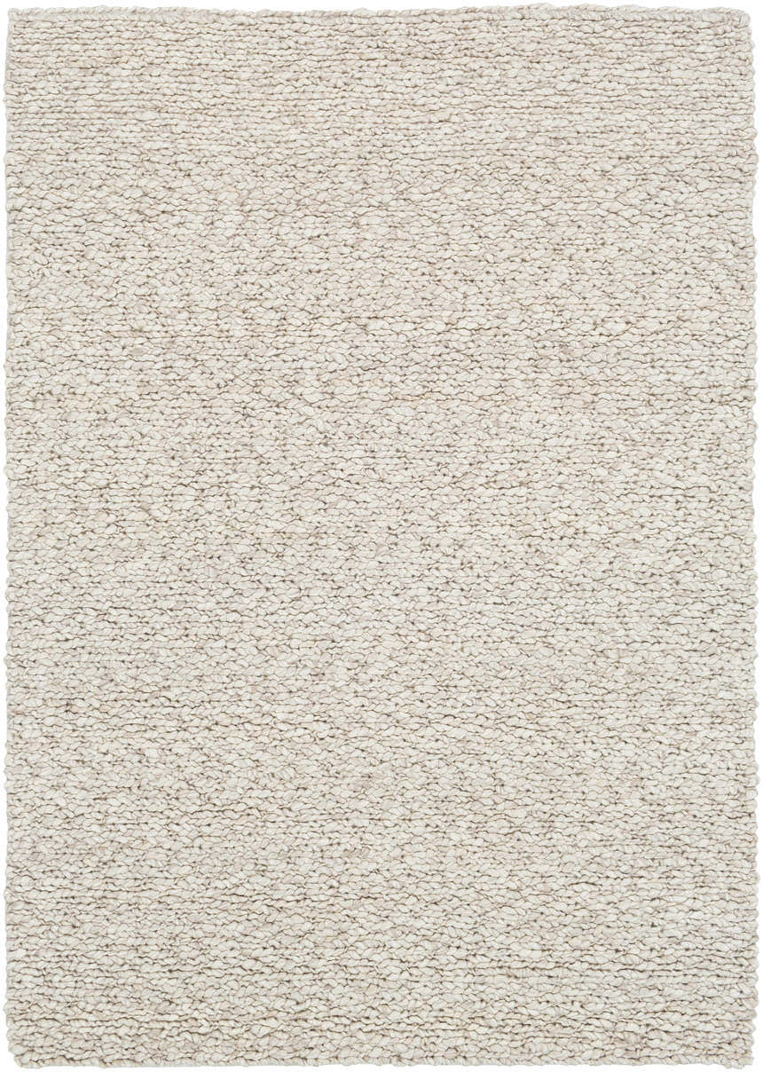 Close-up of the hand-woven Monticello Carpet. Light beige wool rug with a chunky, textured weave. Farmhouse style. Design-Rectangle-576
