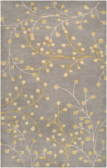 Close-up of the Elsu Mustard Wool Area Rug featuring a floral pattern in mustard and taupe on a charcoal background. Design-Rectangle-58