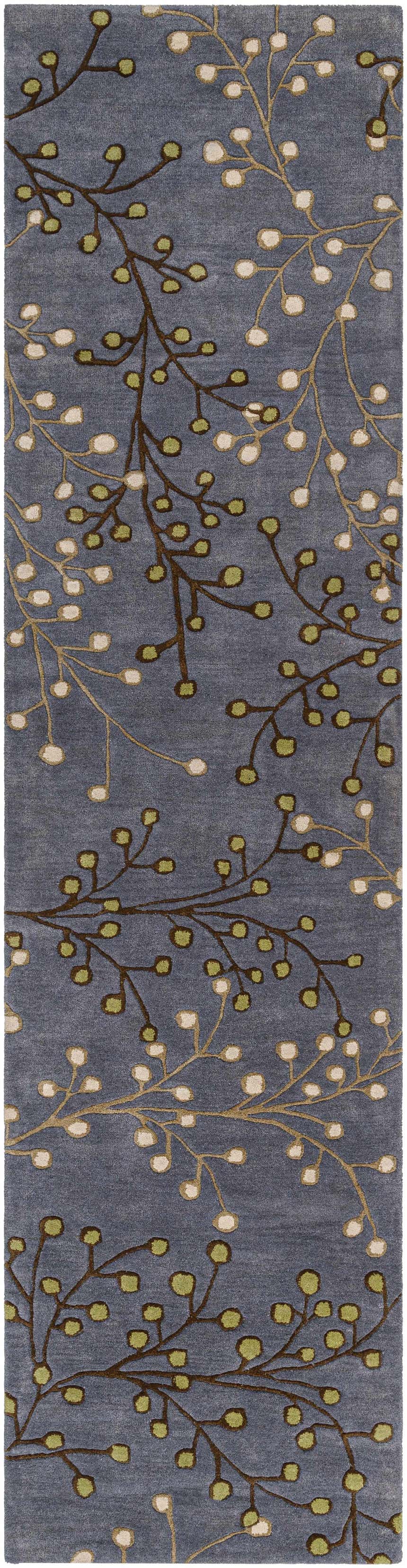 Close-up of the Elsu Brown Beige Wool Rug, featuring a floral pattern with dark brown, beige, and green accents on a denim blue background. Design-Runner-312