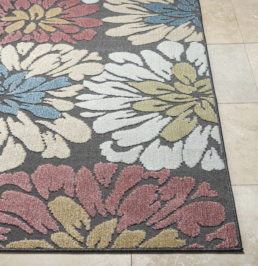 Close-up of Minga Charcoal Area Rug showing floral design in charcoal, cream, navy, olive, rust, and tan colors. Front