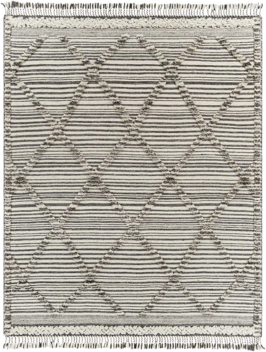 Close-up of the Nairobi Area Rug. Hand-knotted wool rug with black stripes and ivory diamond pattern and fringe. Design-Rectangle-810