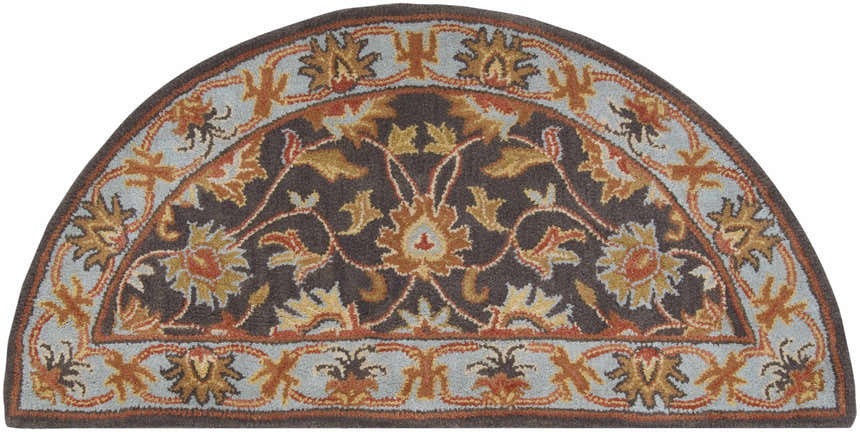 Close-up of the hearth-shaped Cherryfield 1004 rug. Hand-tufted wool rug in beige, burnt orange, and slate blue floral pattern. Design-Hearth