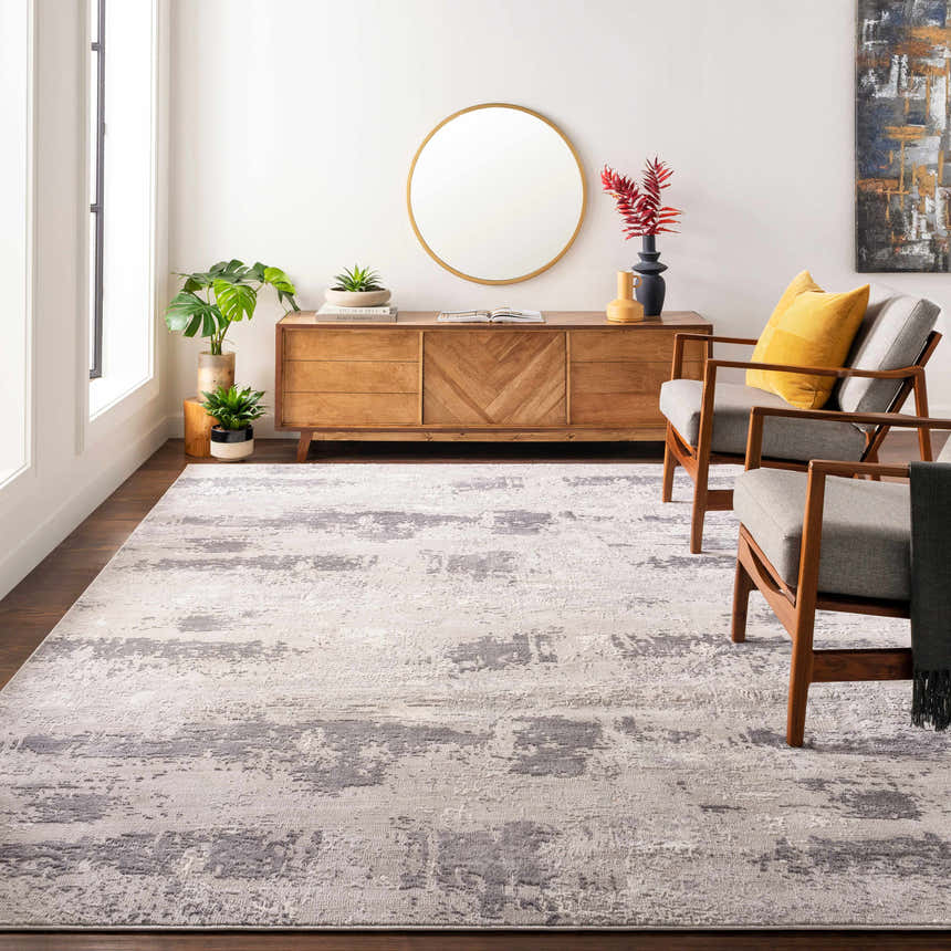 Living room scene with a charcoal and gray Neponsit Area Rug, wood furniture, and modern decor. Roomscene-Rectangle