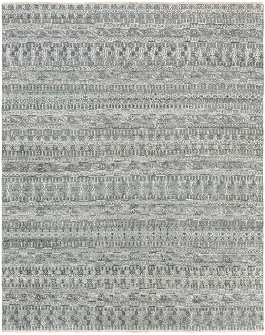 Close-up of the Normanhurst Area Rug. Hand-knotted wool and viscose rug with a bohemian-inspired charcoal, ivory, and sage pattern. Design-Rectangle-69